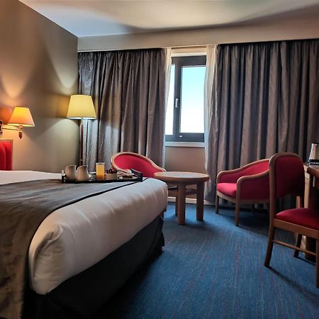 Hotel Mercure Alger Aeroport Maison Blanche Bagian luar foto A room at the hotel
