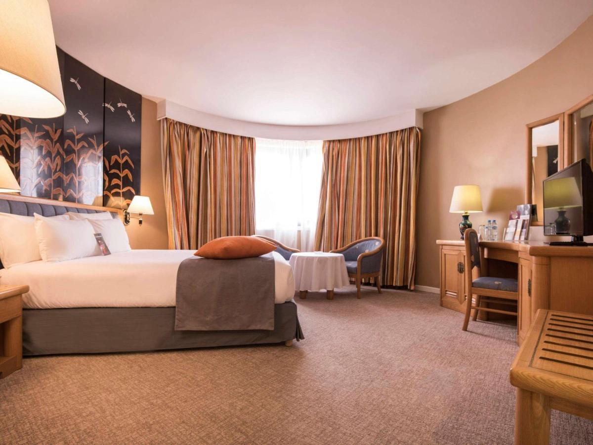 Hotel Mercure Alger Aeroport Maison Blanche Bagian luar foto A room at the hotel