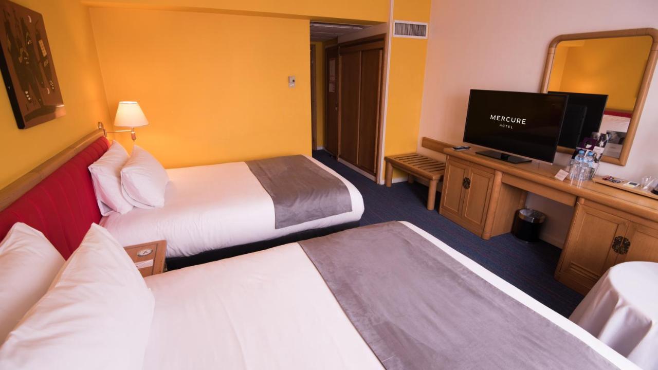 Hotel Mercure Alger Aeroport Maison Blanche Bagian luar foto A typical room at a Mercure hotel