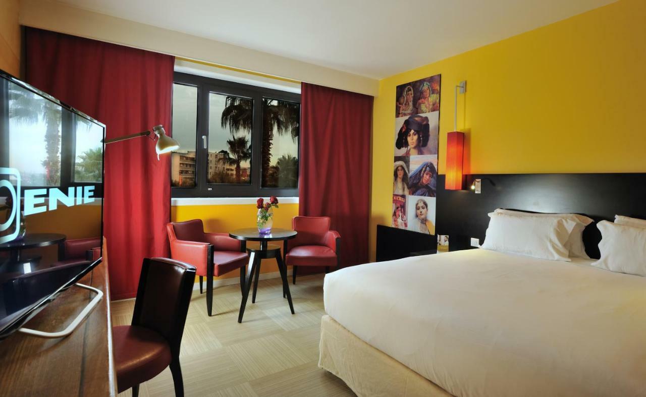 Hotel Mercure Alger Aeroport Maison Blanche Bagian luar foto A room at the hotel